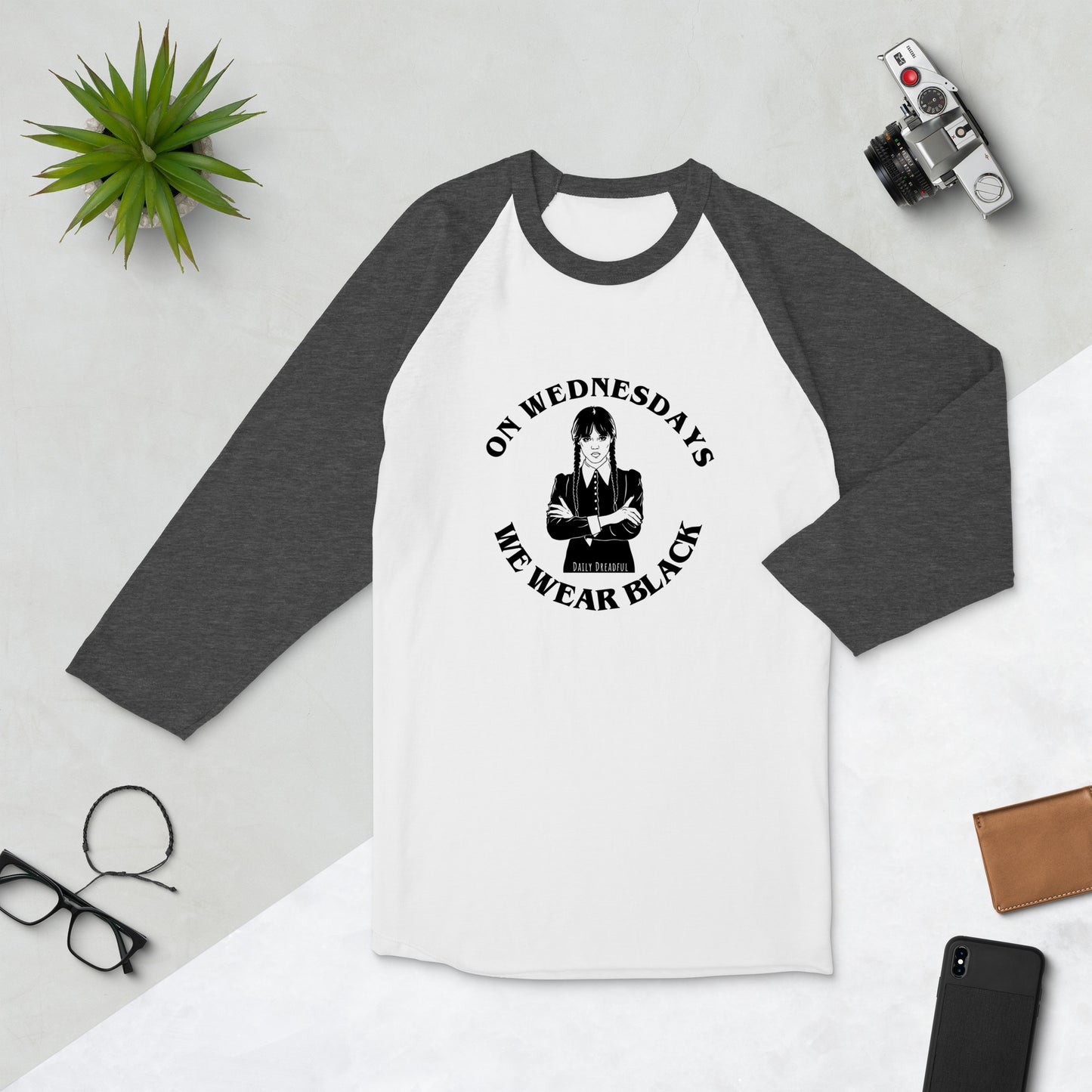 white & heather charcoal "On Wednesdays We Wear Black" 3/4 sleeve raglan shirt comes from Daily Dreadful