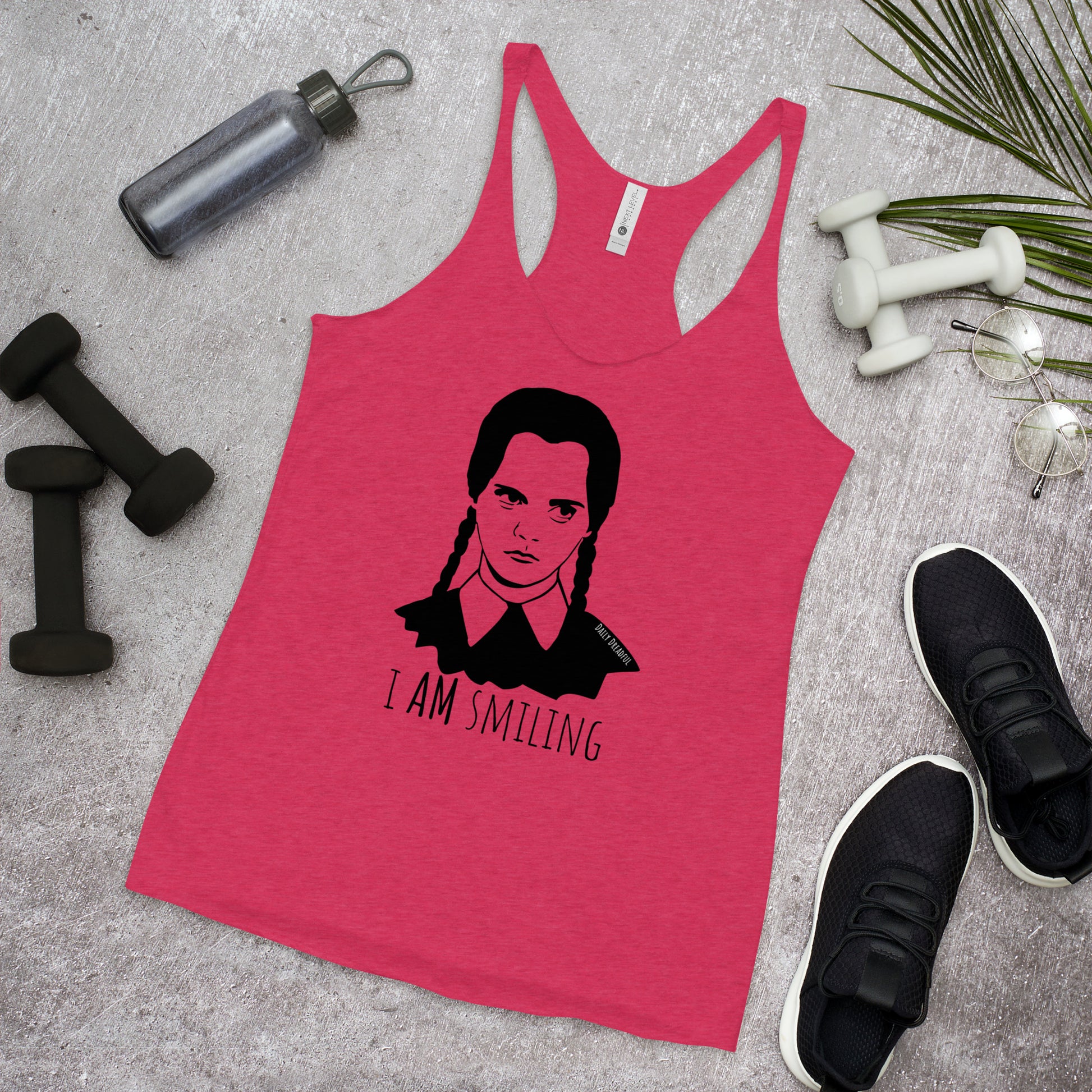 vintage shocking pink "I Am Smiling" Wednesday Addams Racerback Tank Top from Daily Dreadful